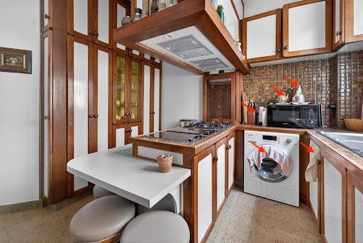 Photographie immobilière Paris - erreur à éviter avec cuisine encombrée et éléments visibles avant shooting immobilier